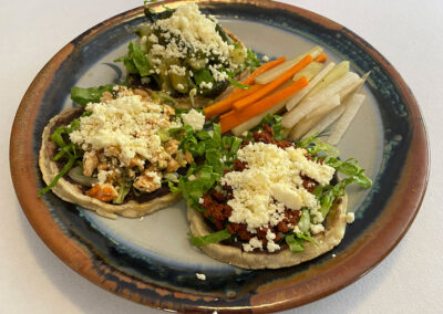 Sopes are served with various toppings at zandoyo bed & breakfast